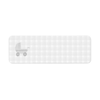 Light gray and white baby pram. label