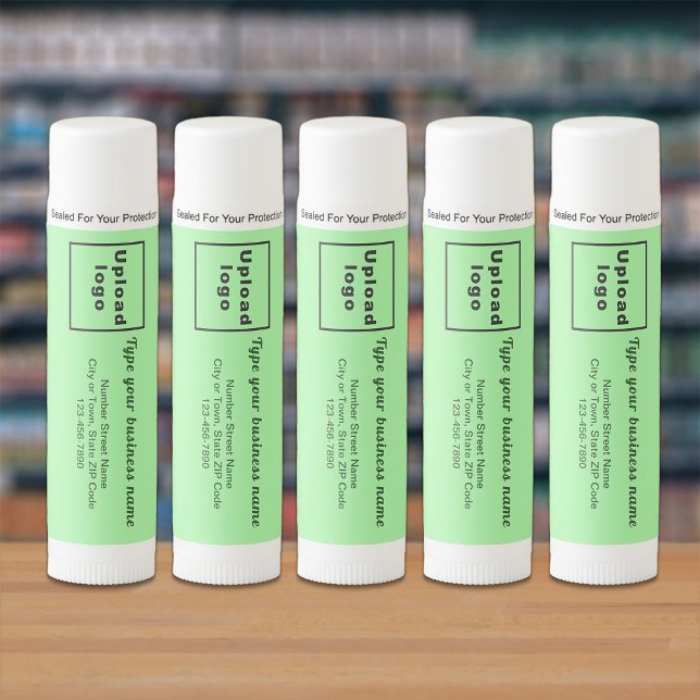 Light Green Business Brand on Lip Balm (Lip balm with light green front label and your business brand displayed in a store.)