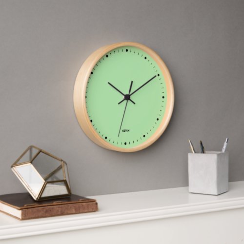 Light green clock face and black hours numbers