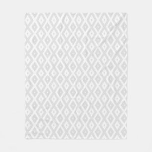 Light grey and white diamond pattern fleece blanket
