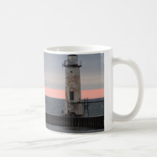 Light house and sunset view coffee mug