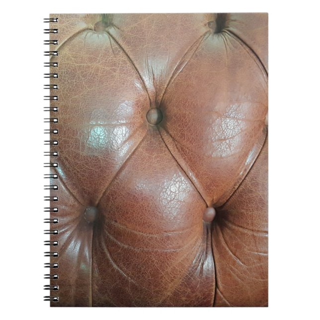 Light on brown leather sofa surface, textureabstra notebook (Front)