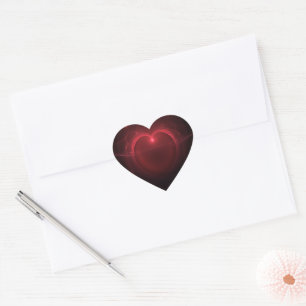 Lighted Heart Over Black Background Sticker