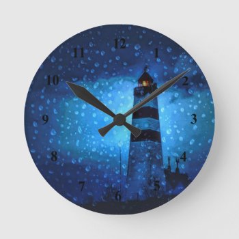 Lighthouse A Rainy Blue Dark Night Nautical Round Clock by Nordic_designs at Zazzle