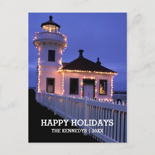 Lighthouse at Night with Christmas Lights Holiday Postcard
