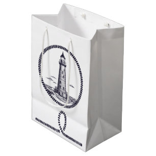 Lighthouse at the sea in round rope frame medium gift bag