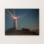 Lighthouse on a Hill Shining at Night Jigsaw Puzzle<br><div class="desc">This photo features the Hiddensee Lighthouse shining at night on Dornbusch Hill.</div>