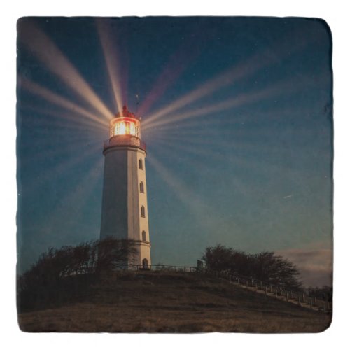 Lighthouse on a Hill Shining at Night Trivet