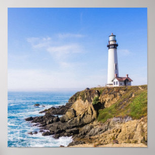 Lighthouse on hill blue sky white house ocean poster