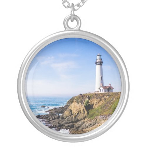 Lighthouse on hill blue sky white house ocean silver plated necklace