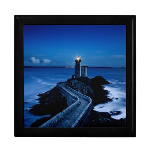 Lighthouse on wall in ocean at night gift box