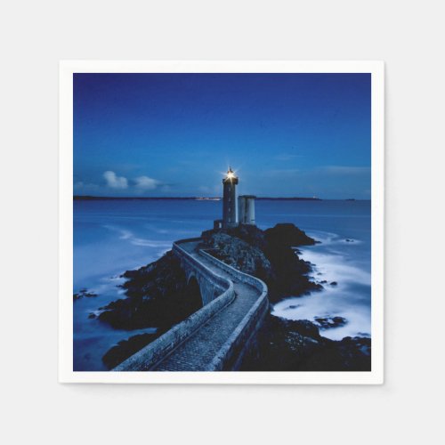 Lighthouse on wall in ocean at night napkins