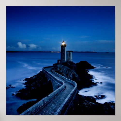 Lighthouse on wall in ocean at night poster