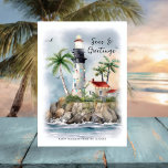 Lighthouse Palm Tree Sea Coastal Christmas Holiday Card<br><div class="desc">Light up the holidays and send your 'Seas & Greetings' with this coastal Christmas card featuring a watercolor lighthouse decorated with festive string lights,  tropical palm trees and ocean waves. Art by KL Stock</div>