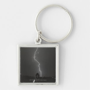 Lightning over city keychain