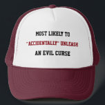 Likely to "accidentally" unleash an evil curse trucker hat<br><div class="desc">This funny hat is decorated with the text "Most likely to accidentally unleash an evil curse". It is perfect for archaeologists, historians, adventurers, or simply friends with a passion for horror... and a hidden dark side who would love to unleash ancient evils upon their enemies, of course. Or simply to...</div>