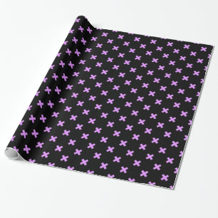 Lilac cross stitches on black wrapping paper