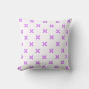 Lilac cross stitches on white throw pillow