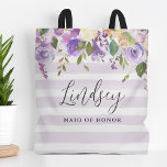 Lilac Floral and Stripes Maid of Honor Monogram Tote Bag<br><div class="desc">Custom monogrammed tote bags make the perfect gift for your bridesmaids and wedding party. This pretty design features a watercolor floral border in shades of pastel purple and green over a lavender striped background. Personalize each bag with your bridesmaids' name and add the bride and groom's initial and wedding date...</div>