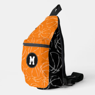 line art basketballs on black orange color blocks sling bag