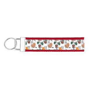 Line art drawing cats and flowers wrist keychain