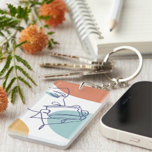 line art drawing poster of woman drinking coffee   keychain