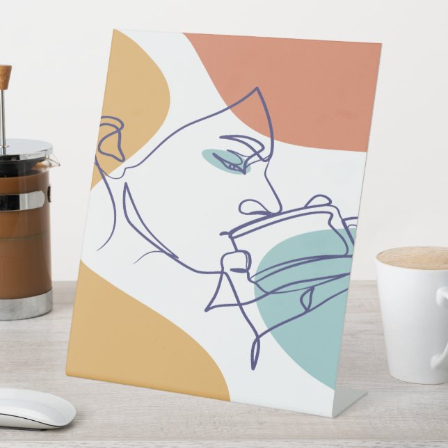 line art drawing poster of woman drinking coffee   pedestal sign (In SItu)