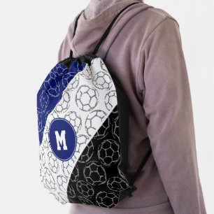 line art soccer balls pattern on blue white black drawstring bag