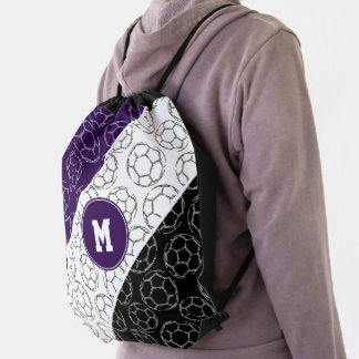 line art soccer balls pattern on purple black drawstring bag