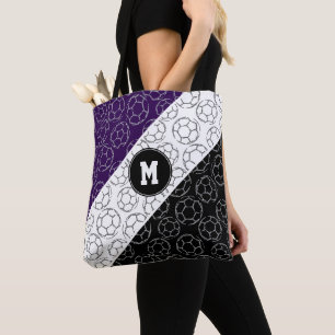 line art soccer balls pattern on purple black tote bag