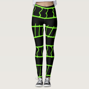 Lines and shapes pattern over black background leggings