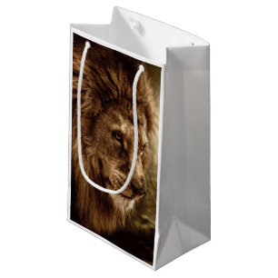 Lion against stormy sky small gift bag