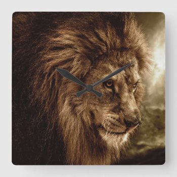 Lion Against Stormy Sky Square Wall Clock by wildlifecollection at Zazzle