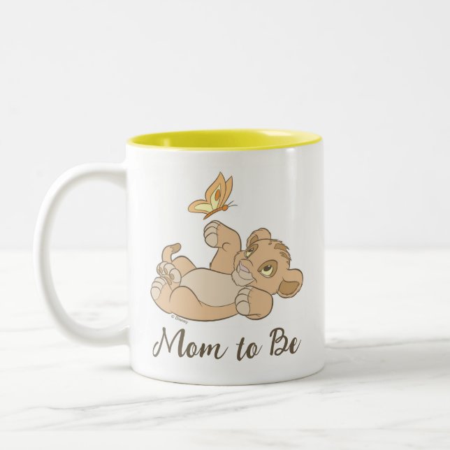 Lion King's Baby Simba Playing "Mom to Be" Two-Tone Coffee Mug (Left)