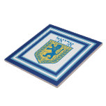 Lion of Judah Emblem Ariel Hebrew Tile<br><div class="desc">Square ceramic tile with an image of a blue and yellow Lion of Judah emblem on white with light blue and dark blue borders and “Ariel” in Hebrew in blue letters above it. See matching mug, paper plate and coasters. See the entire Hanukkah Tile collection under the HOME category in...</div>