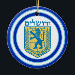 Lion of Judah Emblem Jerusalem Hebrew Ceramic Ornament<br><div class="desc">Round ceramic ornament with an image,  on both sides,  of a blue and yellow Lion of Judah emblem and wide double blue borders trimmed in light blue on white. See the entire Hanukkah Ornament collection under the HOME category in the HOLIDAYS section.</div>