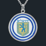 Lion of Judah Emblem Jerusalem Hebrew Sterling Silver Necklace<br><div class="desc">Medium round sterling silver necklace with an image of a blue and yellow Lion of Judah emblem on white with light blue and dark blue borders and “Jerusalem” in Hebrew in blue letters above it. See matching square button, square charm, large round premium metal keychain, square double-sided acrylic keychain and...</div>