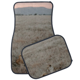 LION ON BROWN GRASS FIELD DURING DAYTIME CAR FLOOR MAT