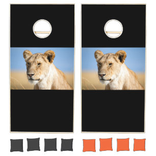 Lioness against blue sky cornhole set