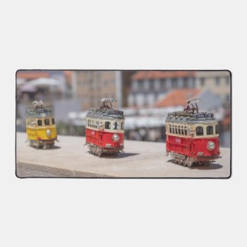 Lisbon Toy Trams Desk Mat by RossiCards at Zazzle
