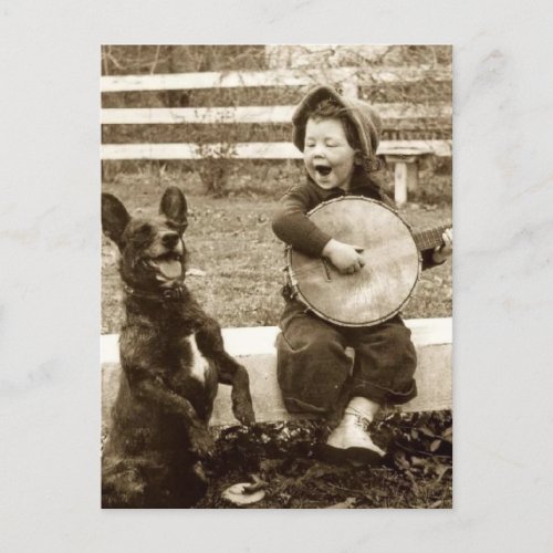 Little boy and dog music postcard