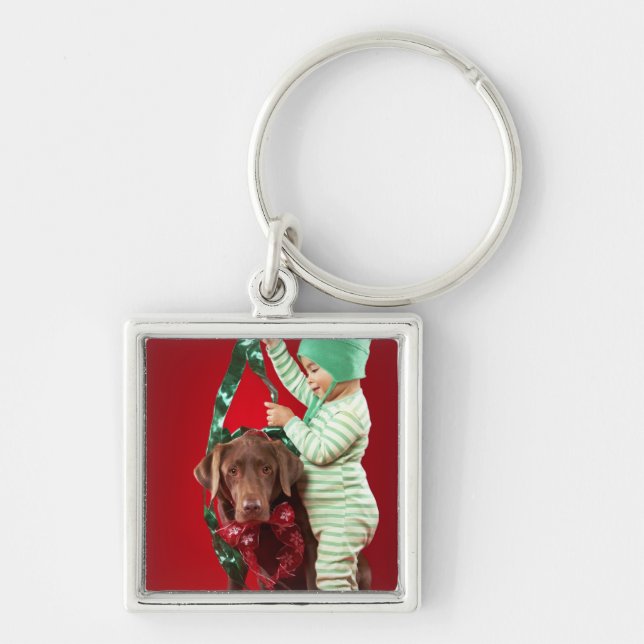 Little boy decorating a dog keychain (Front)