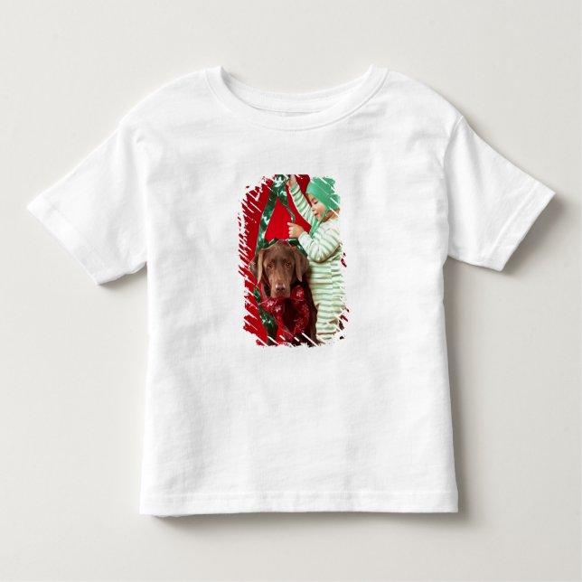 Little boy decorating a dog toddler t-shirt (Front)