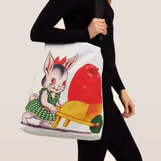 little bunny pushing cart with great big apple crossbody bag