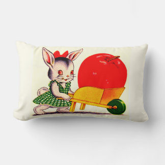 little bunny pushing cart with great big apple lumbar pillow