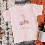 Little Deer First Birthday Monogrammed Toddler T-shirt<br><div class="desc">Custom name toddler shirt or baby bodysuit for your baby girl's first birthday party or cake smash photos. This sweet design features a sweet pink watercolor number one surrounded by boho flowers and a baby deer. Perfect for a whimsical woodland little girl's first birthday party! Personalize it with your child's...</div>