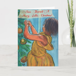 Little girl decorating Christmas tree Card