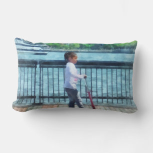 Little Girl on Scooter by Manhattan Skyline Lumbar Pillow