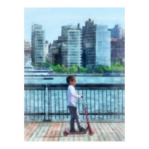 Little Girl on Scooter by Manhattan Skyline