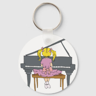 little girl playing piano keychain